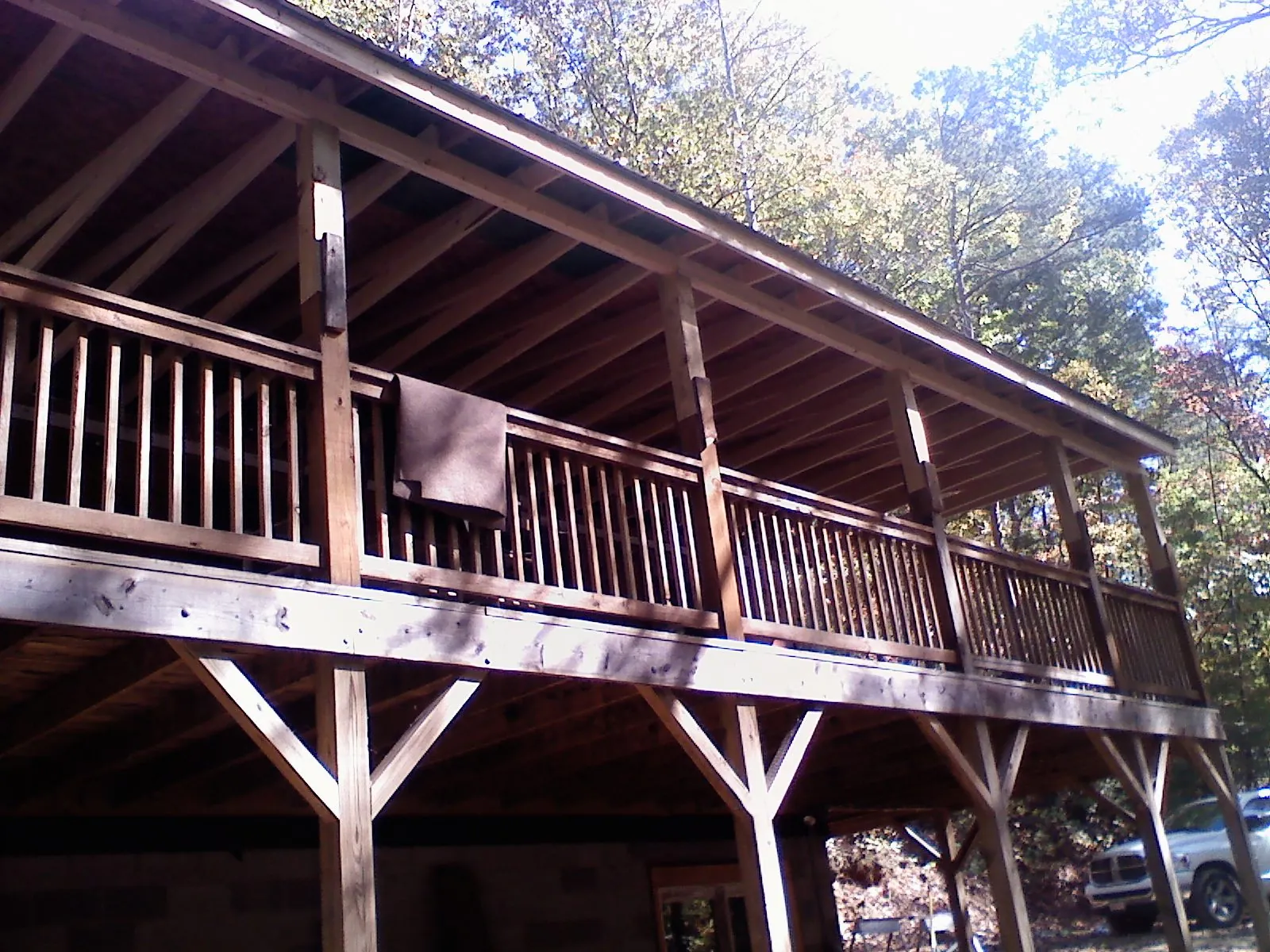 Timber framing under a new elevated porch and deck — Roof Leak Repair in Canby by Roofing Brothers